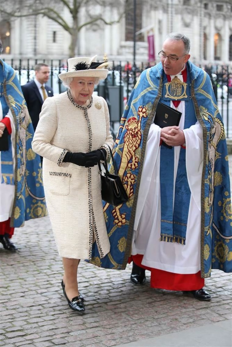 The Queen arrives at Westminster Abbey.