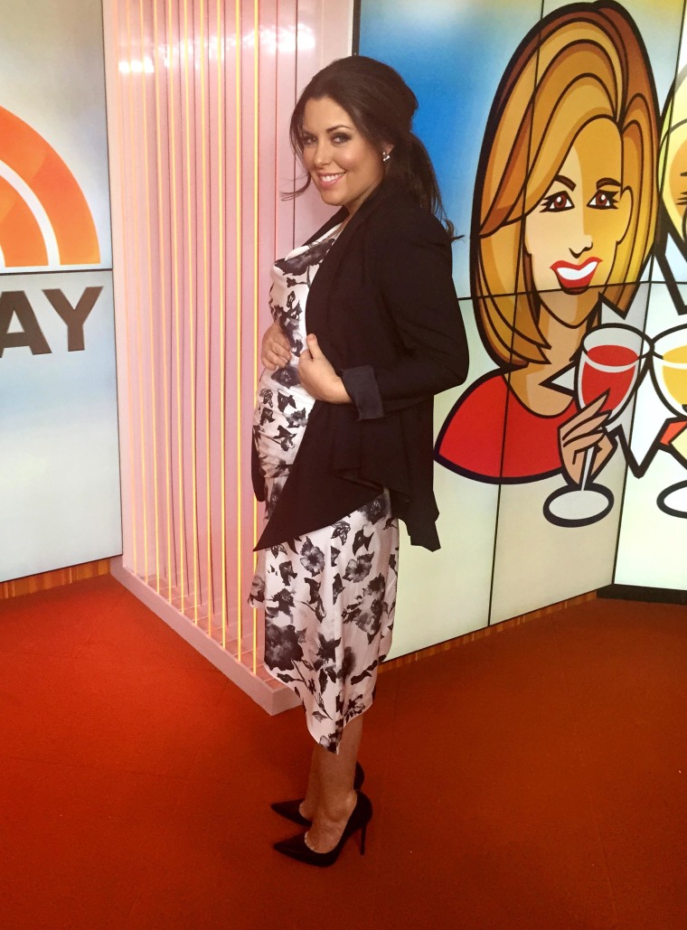 Bobbie Thomas shows off her baby bump.