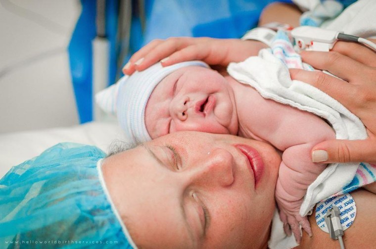 Bobbi Jo Fischer holds her son Ezekiel during her family-centered cesarean section on Aug. 15, 2013, at Aspirus Wausau Hospital in Wisconsin.