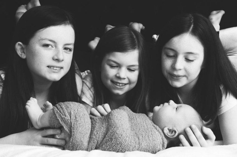 Baby Cillian with his big sisters: Sophia, 12; Ellie, 11; Eva, 8.