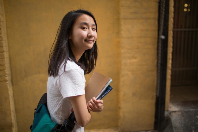 Image: ARosa Chen stands in Chinatown where she gives historical tours with the Chinatown Community Development Center.