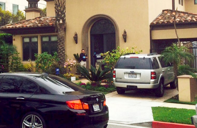 ICE agents search a house in Beverly Hills, California on March 11, 2015.