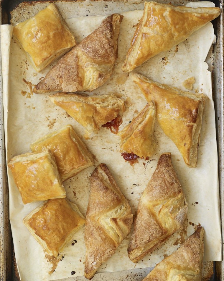 A picture of pastelitos de guayaba, or guava turnovers, from "The Cuban Table: A Celebration of Food, Flavors, And History" By Ana Sofia Pelaez (author) and Ellen Silverman (photographer)