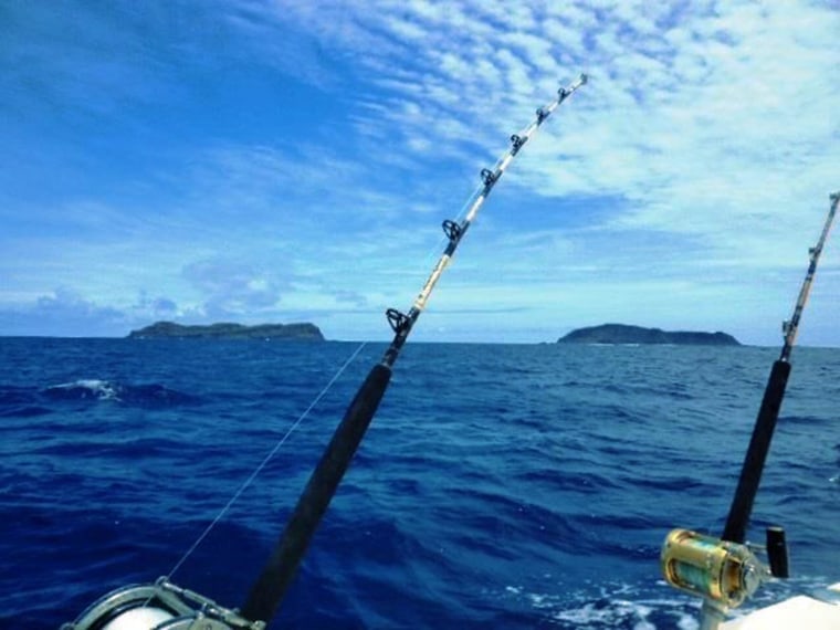 A photo by charter boat owner Branco Sugar shows the space between two islands before a volcanic eruption created a third island.