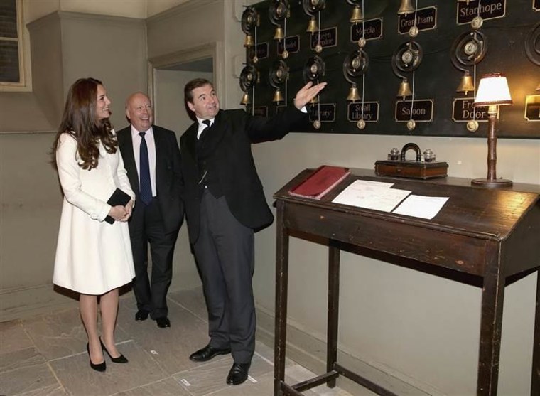 Duchess Kate, talking with actor Brendan Coyle while visiting the Downton Abbey set last week