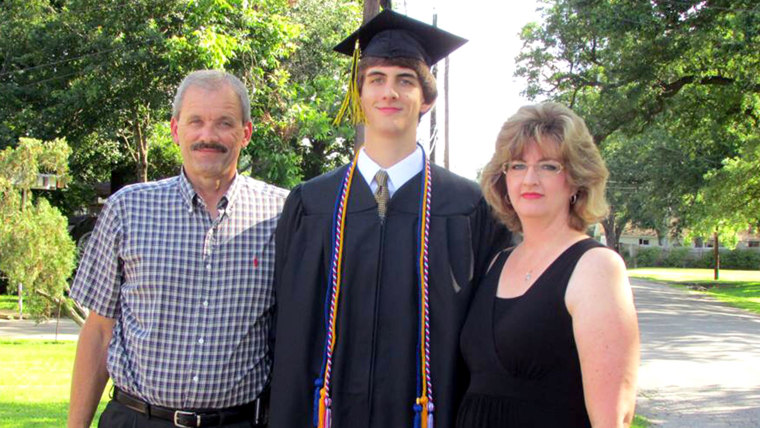 Why, hello down there Mom and Dad: Kenny Litvik, Evan Litvik, and Amie Litvik at Evan’s high school graduation.