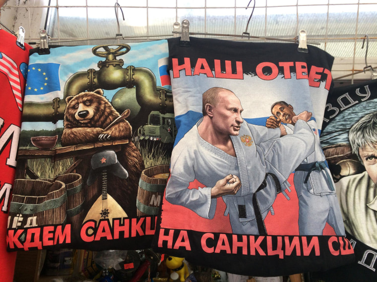 Image: Strongman Putin: T-shirts for sale at a souvenir shop in Yalta,where many remain defiant after international sanctions following theRussian annexation of Crimea.