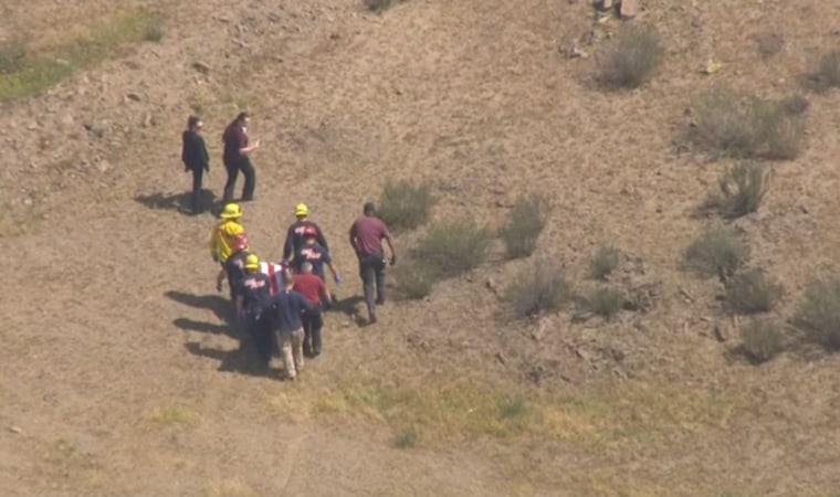 IMAGE: Parachutist removed from accident scene