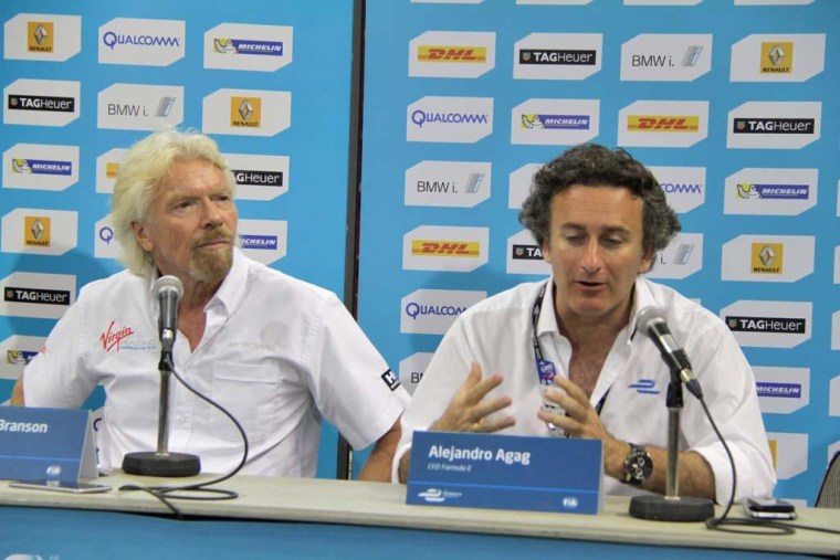 Sir Richard Branson and ePrix series organizer Alejandro Agag give a news conference at a Formula E electric vehicle race in Miami.