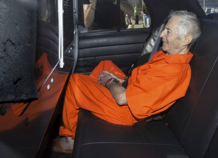Image: File photo of Robert Durst sitting in a police vehicle as he leaves a courthouse in New Orleans