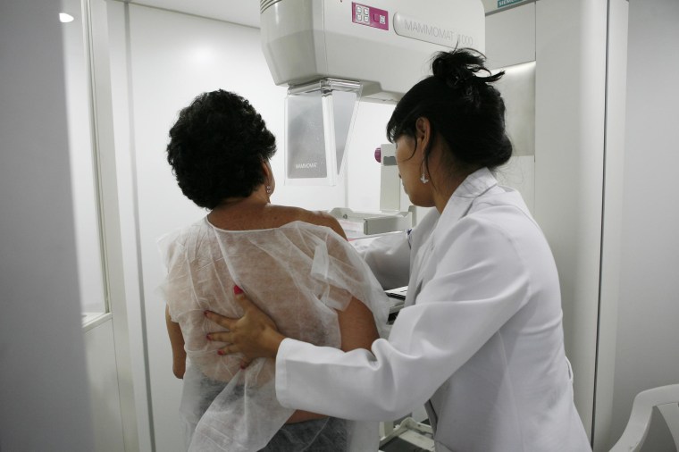 A woman undergoes a free mammogram inside Peru's first mobile unit for breast cancer detection, in Lima
