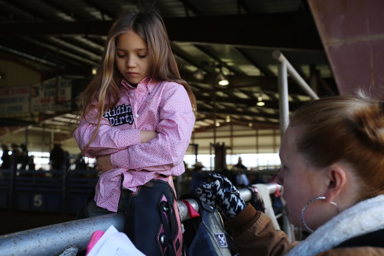 Image: Jadeyn Laura, 7, after she got stepped on during a calf-riding competition