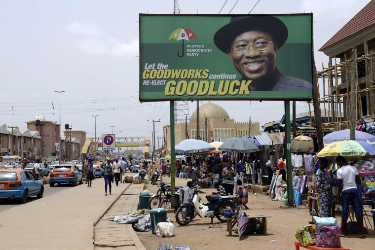 Image:Photo shows a campaign billboard of Nigerian President Goodluck Jonathan and candidate of the ruling Peoples Democratic Party (PDP)  in downtown Akure, Ondo State southwestern Nigeria, on March 23. Africa's most populous country and top economy, Nig