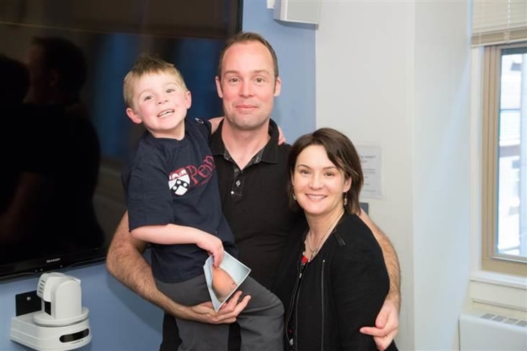 The Gray family visits the Genetic Diagnostic Laboratory in the department of genetics at the Perelman School of Medicine, University of Pennsylvania on March 23.