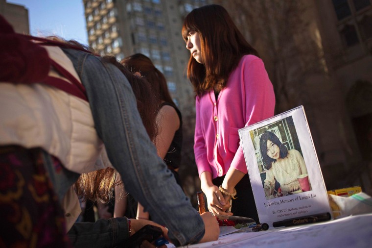 Image: A photo of Boston Marathon bombing victim Lu is seen outside the Boston University Marsh Chapel in Massachusetts