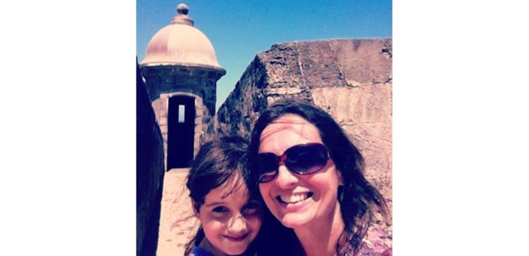 Image: Monica Morales, a resident of Puerto Rico, with her daughter