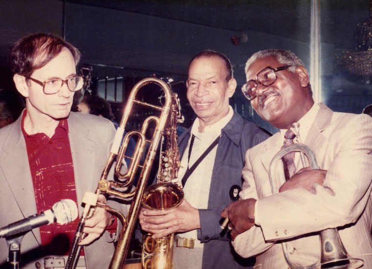 Salsa legend Alfredo “Chocolate” Armenteros, at right, poses with musicians Barry Rodgers, left, and Chombo Silva.