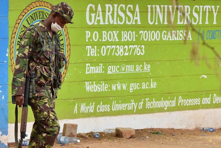 Image: A Kenya Defence forces soldier walks past the front entrance of Moi University Garissa
