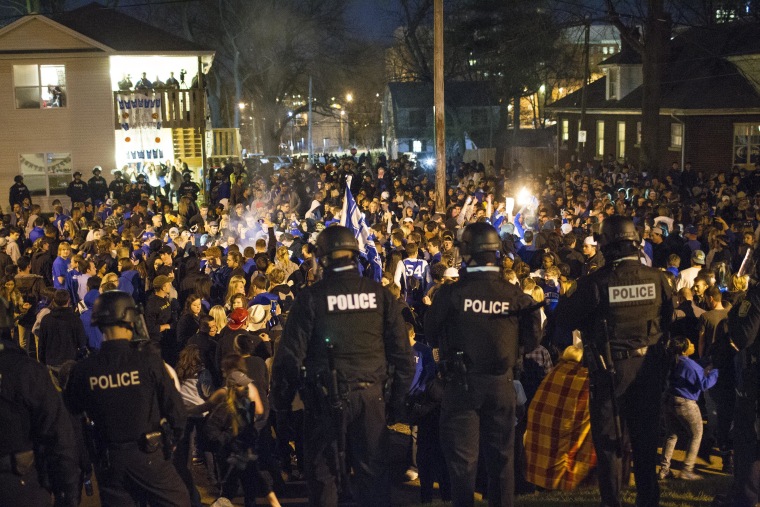 Kentucky fans gather near the University of Kentucky campus, Saturday, April 4, 2015, in Lexington, Ky., after Wisconsin defeated Kentucky 71-64 in the semifinals of the NCAA men's college basketball tournament Final Four in Indianapolis.