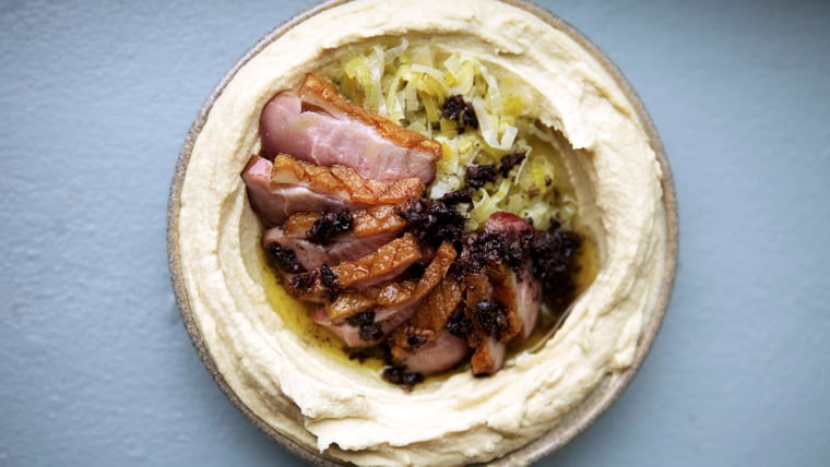 Chef Alon Shaya's Hummus with roasted duck, buttered leeks and olives