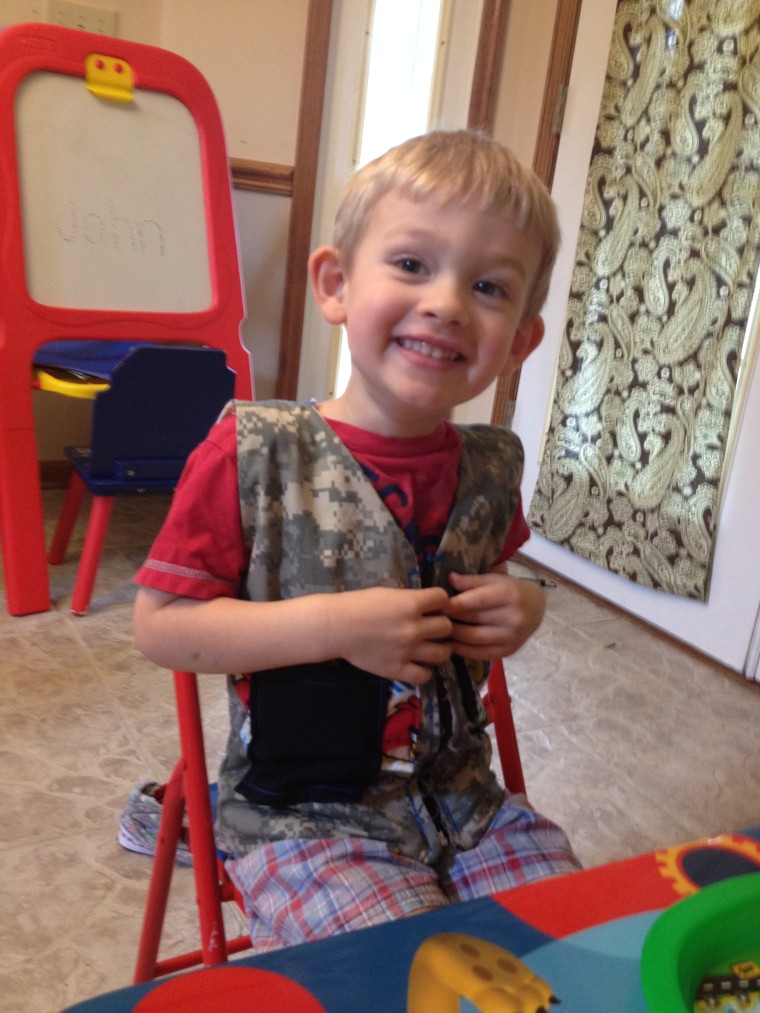 Crystal Lyons created a weighted vest for her son John out of her husband's old military uniform.