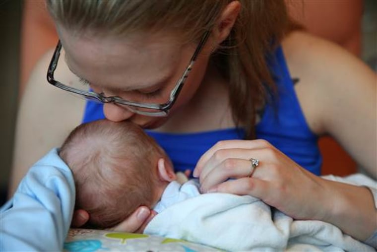 Brandi McGlathery tends to Eli in the hospital.