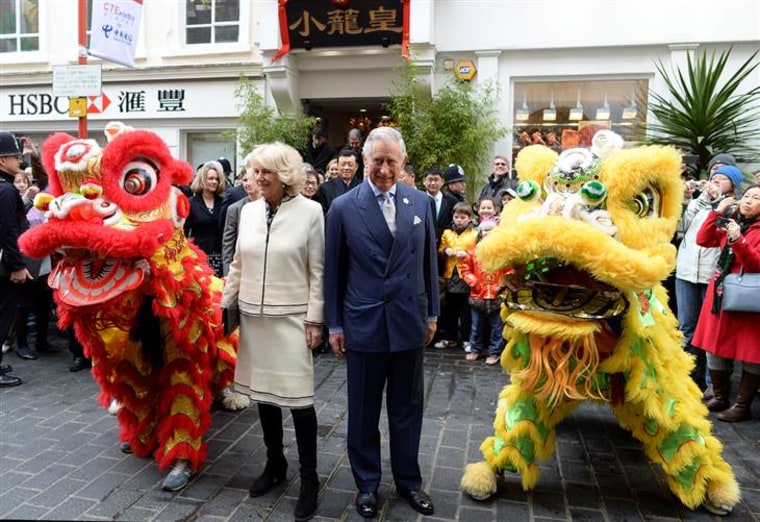 LONDON, ENGLAND - FEBRUARY 19:  Prince Charles, Prince of Wales and Camilla, Duchess of Cornwall during an official visit to Chinatown to mark Chinese...