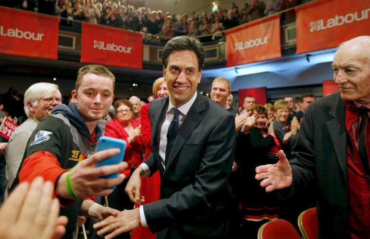 Image: Britain's opposition Labour Party leader Ed Miliband arrives at an election campaign event in Warrington, north west England