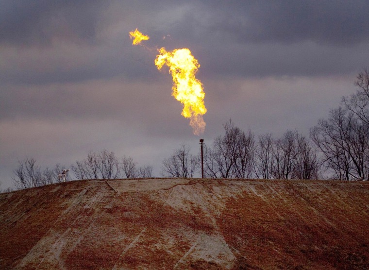 Image: A gas flare burns at a fracking site in rural Bradford County, Pennsylvania