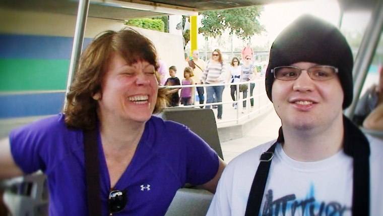 Lenore Kubicsko and her son Nick enjoy time on a ride in Disney World where the family had their first vacation in more than seven years.