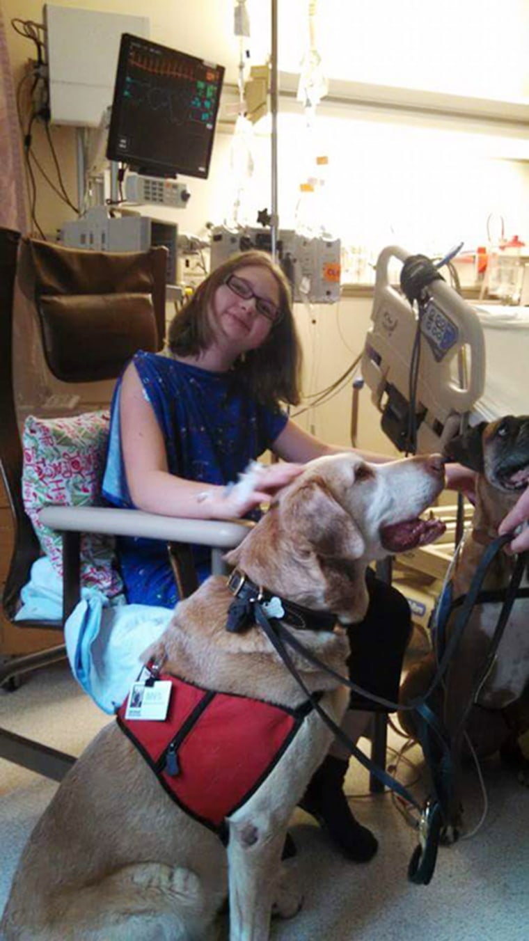 Aimee Champagne with her therapy dog