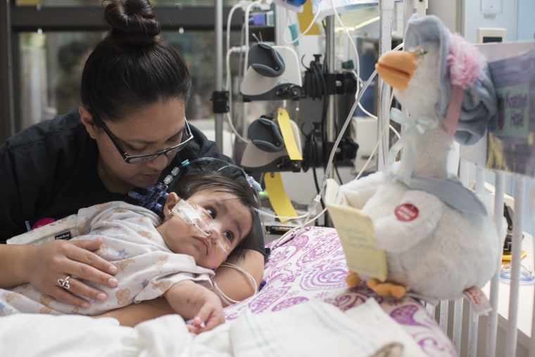 Elysse Mata holds her daughter Knatalye Hope.