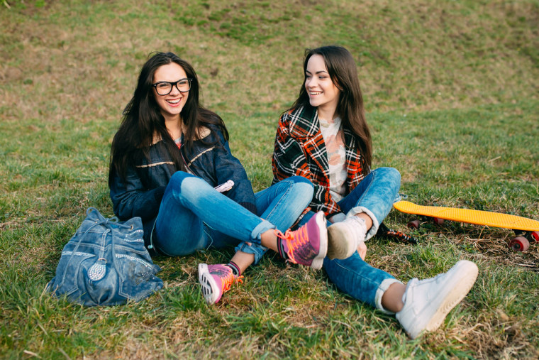 two happy women friends