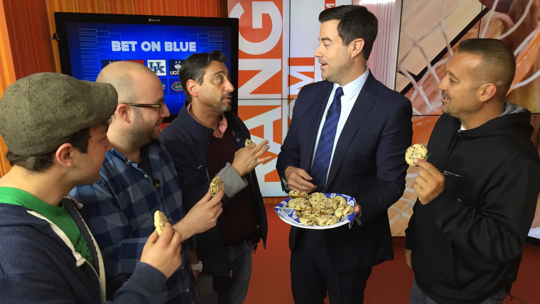 Carson Daly hands out cookies to the TODAY crew in the Orange Room