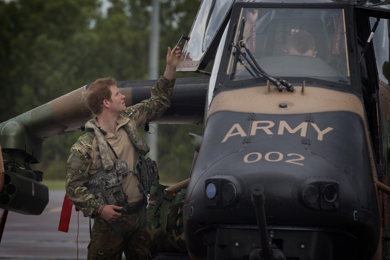 Captain Wales prepares for flight on an Armed Reconnaissance Helicopter (ARH) Tiger with the Australian Army’s 1st Aviation Regiment, Darwin, Northern Territory.