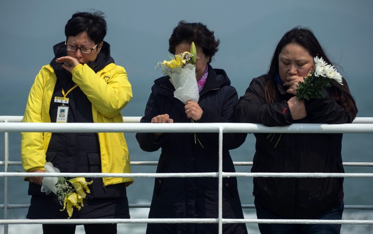 Image: Relatives of victims of the Sewol ferry disaster on Wednesday
