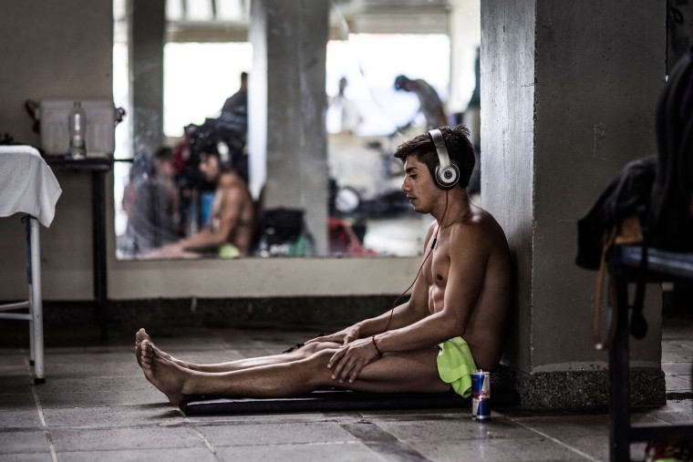 Image: Jonathan Paredes of Mexico relaxes prior to his final dive