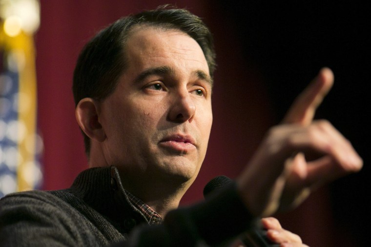 Image: Governor Scott Walker speaks at a Republican organizing meeting in Concord