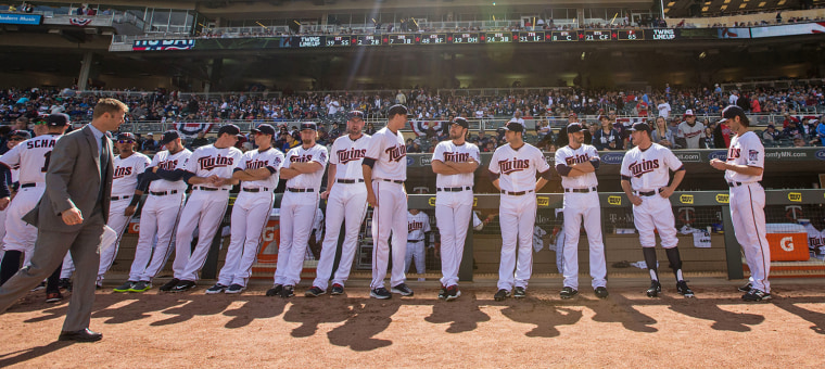 MLB pitcher J.R. Graham wears dark stirrup socks for his mom