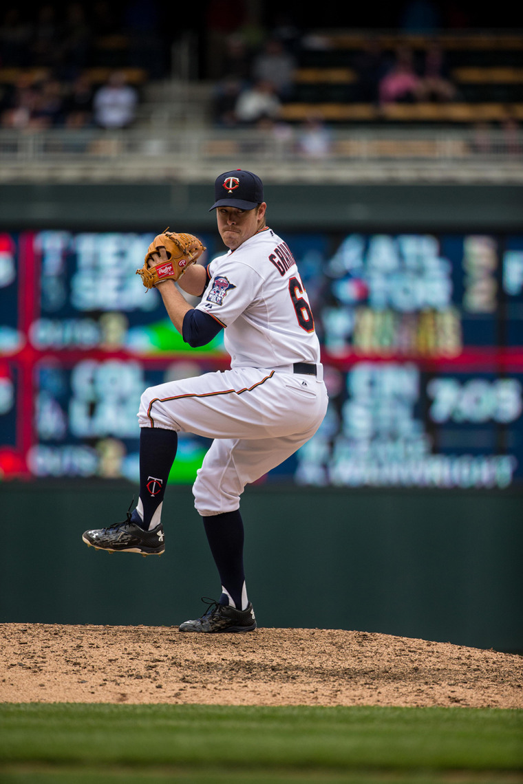 MLB pitcher J.R. Graham wears black stirrup socks for his mom