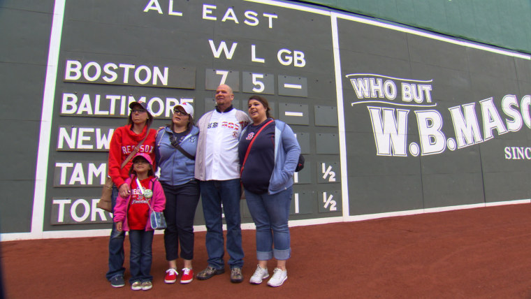 Brian Peterson and his family in Fenway Park