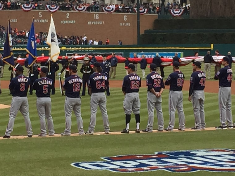 In this photo taken by Julie Graham, her son J.R.'s dark stirrup socks help her spot him on the field.