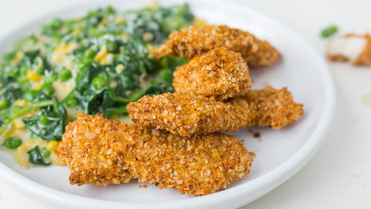 Panko-Crusted Oven-Fried Chicken with Buttered-Feta Corn, Peas, and Spinach