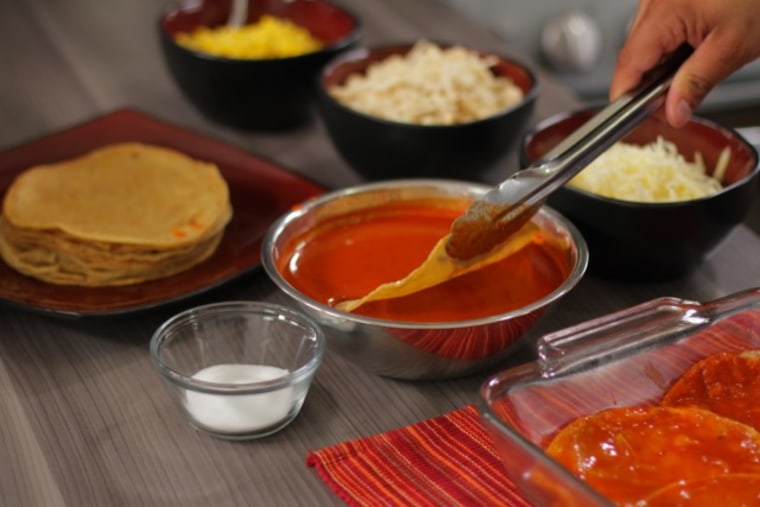 Dip tortillas in enchilada sauce for enchilada casserole