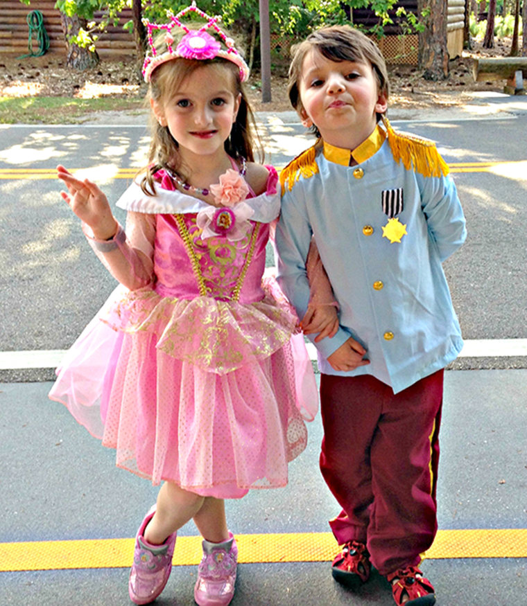 Jacob dresses as Prince Charming at Disneyland with his sister Ella as a princess.