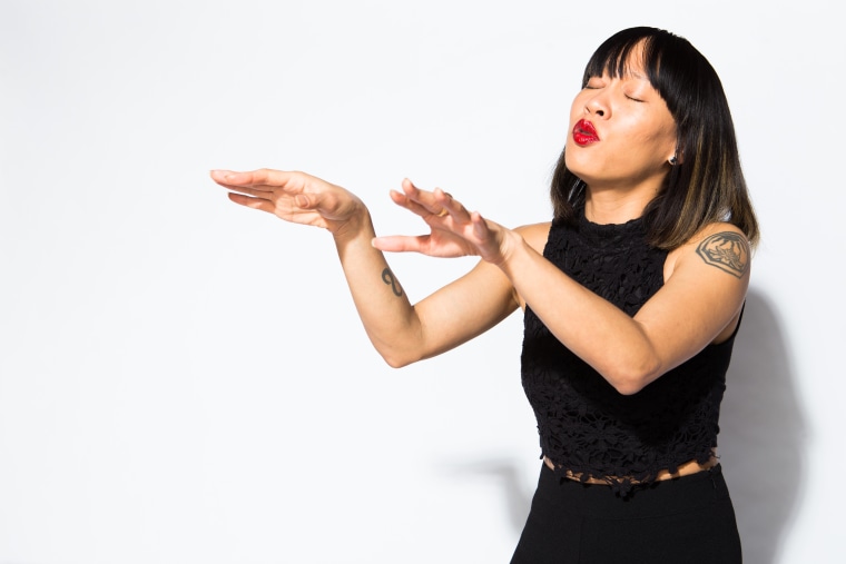 Kelly Tsai performs.