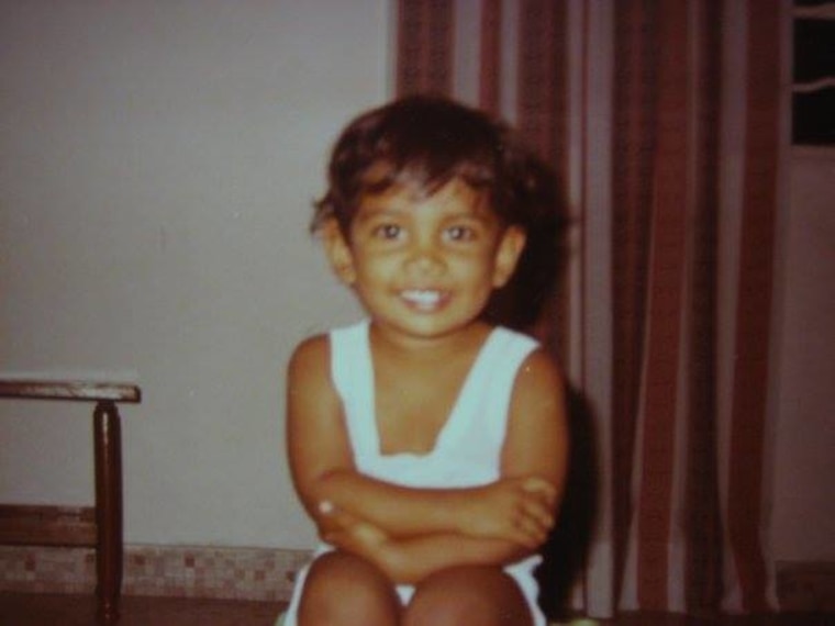 Dashini as a baby in Malaysia.