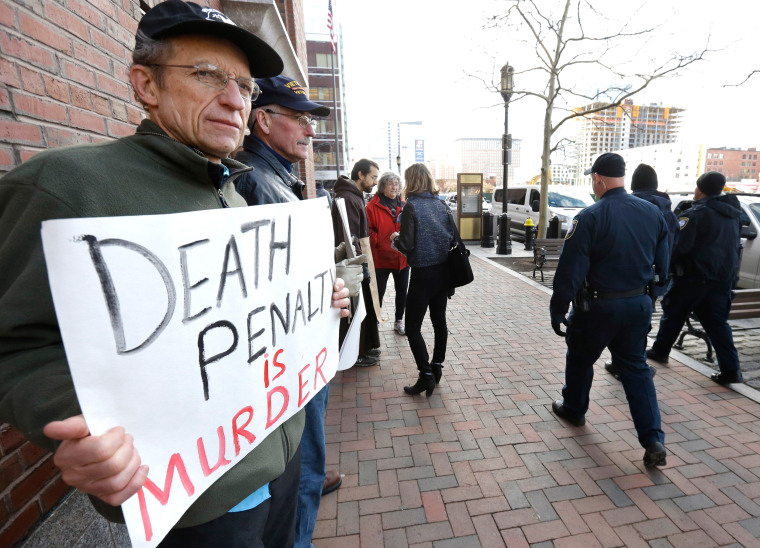 Image: Joe Kebartas protests death penalty.