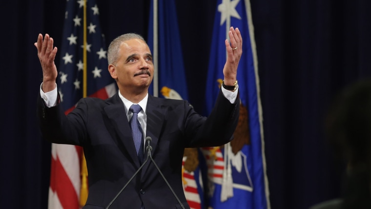 Image: Farewell Ceremony Held For Outgoing Attorney General Eric Holder At Justice Dept.