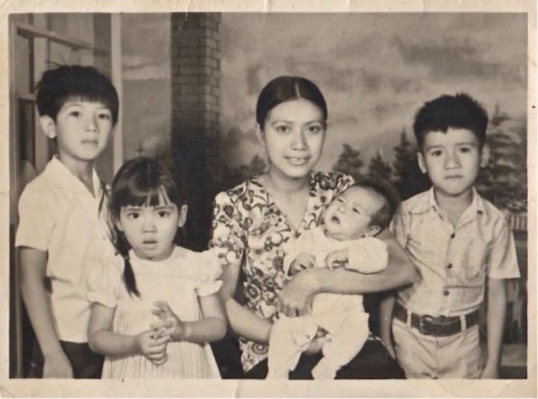 The author, Nina Tarnay, is pictured as a child with her mother and three brothers in Saigon. Her father was imprisoned in a "re-education" camp at the time.